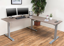 Load image into Gallery viewer, BRODAN Electric Standing L Desk with Power Charging Station, Oak Top with Gray Frame, 67x59 inches